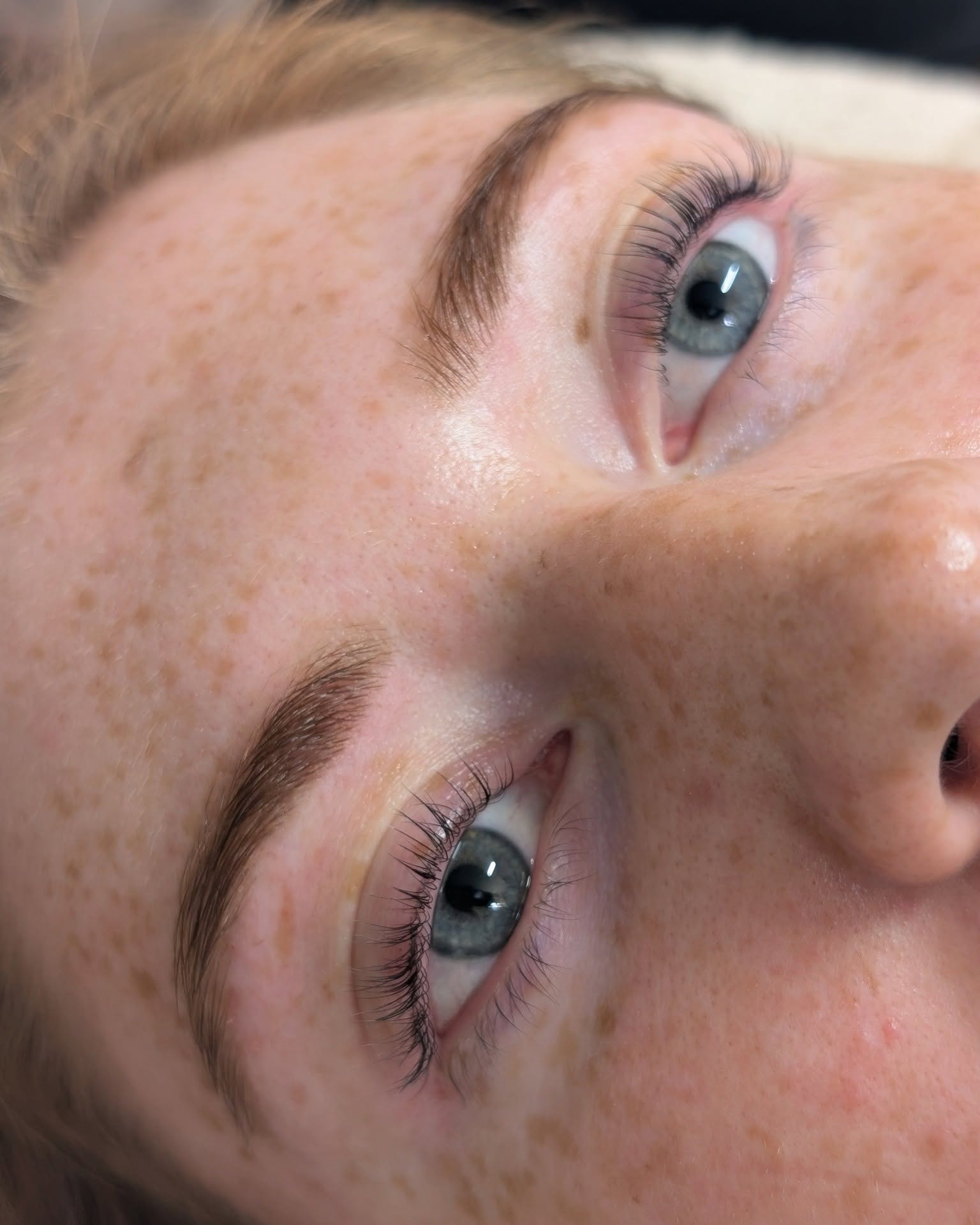 Brows and lashes on a freckled client